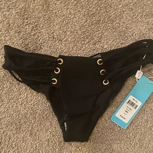 Beach Bunny size medium bottom. Never been worn new with tags.